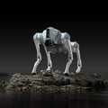 Robot-like creature on a rocky outcrop with a dark background